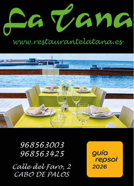 A green and yellow menu for La Tana restaurant. Description generated by AI