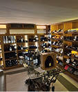 A wine store with a large collection of wine bottles. Description generated by AI