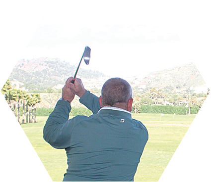 A man is swinging a golf club on a golf course. Description generated by AI