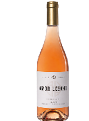 A bottle of wine with a gold top. Description generated by AI
