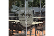 A restaurant with a logo on the window. Description generated by AI